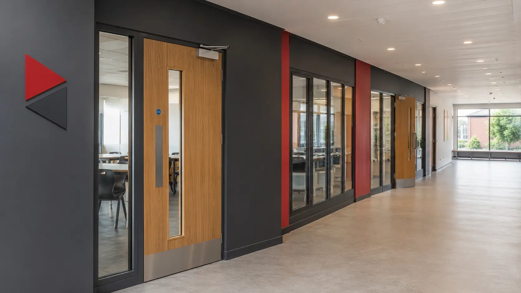 Modern school corridor with timber and glazed fire doors